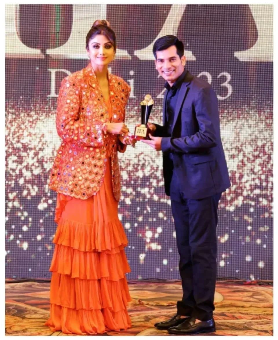 Shashish Kumar Tiwari receiving an award at a past recognition event